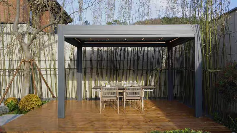 Front view of a grey pergola and dining table in a bamboo garden