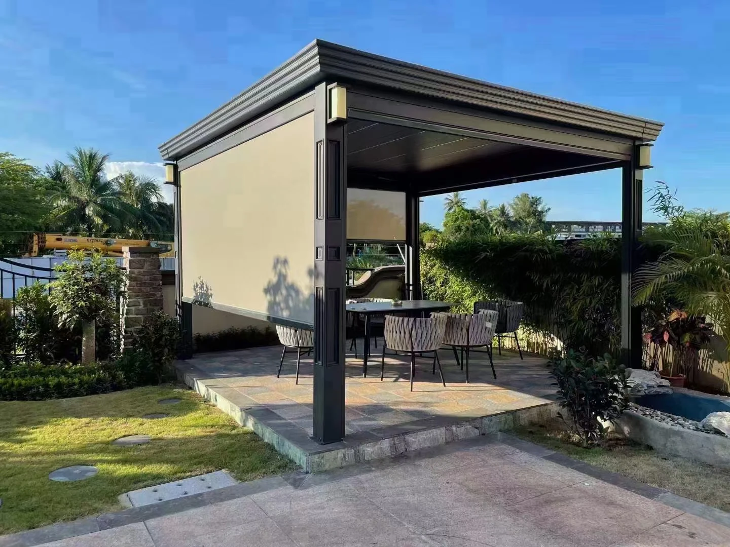 Pergola with decorative eaves and side screen in daylight