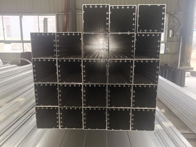 End view of a group of aluminium profiles.